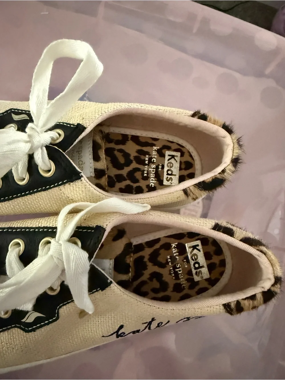 kate spade Cream Canvas Sneakers with Black Trim and Leopard Accent